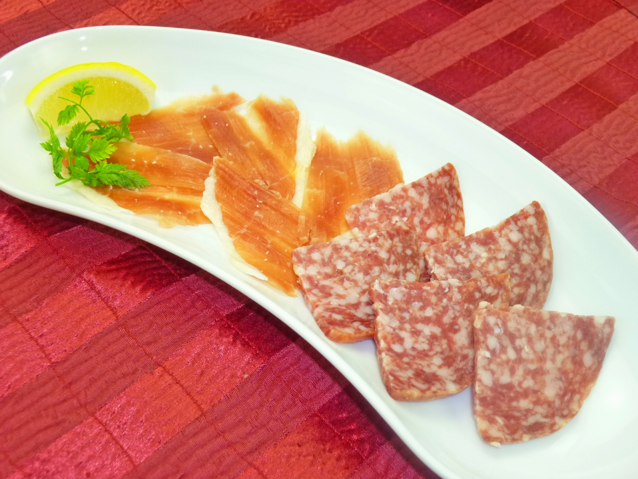 Assorted cured ham and salami